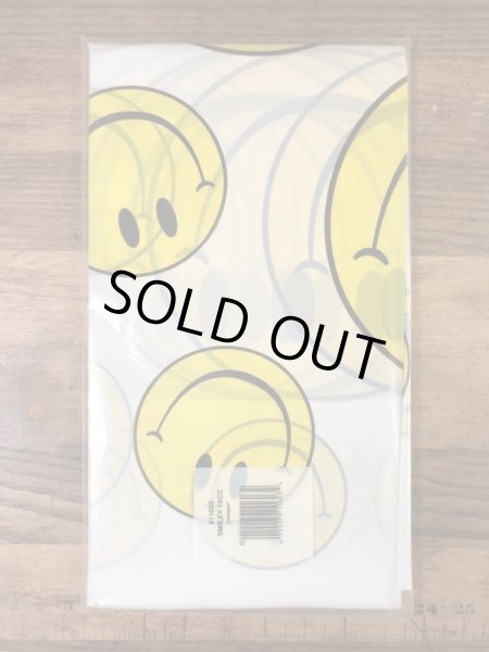 スマイルフェイスのビニール製の80’s〜ヴィンテージテーブルカバー