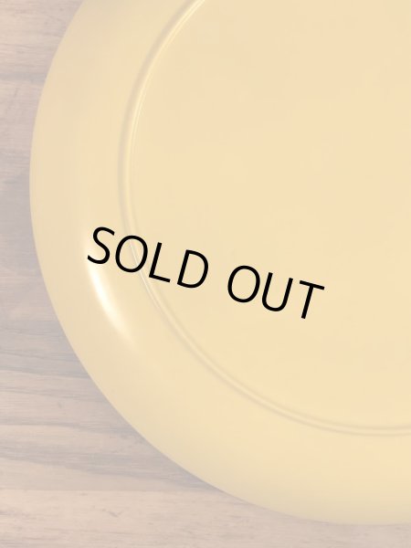 スマイルのプラスチック製の70年代ビンテージお皿