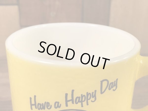 スマイルフェイスとHave A Happy Dayが描かれた70’sヴィンテージヘーゼルアトラスマグ