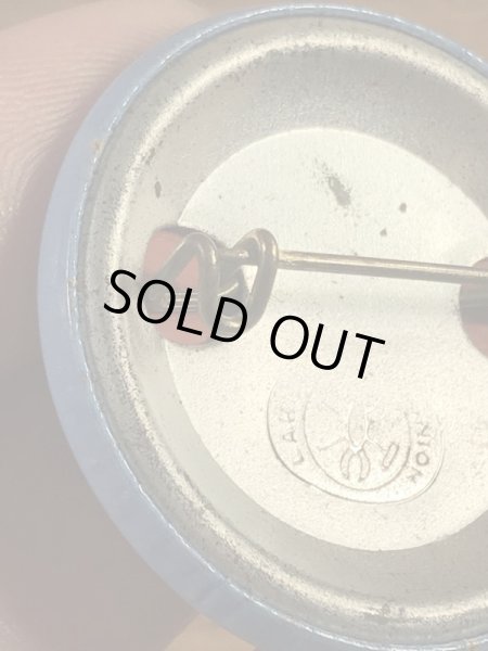 Union Labelの刻印が付いたスマイルフェイスの70’sヴィンテージ缶バッチ