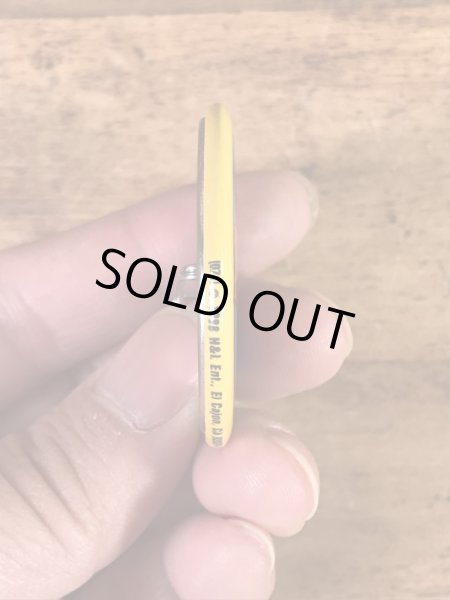 “The One With The Most Buttons Wins”と書かれたスマイルの80年代ビンテージ缶バッジ