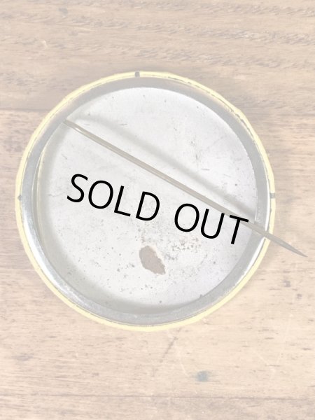 スマイルフェイスのブリキ製の70’sヴィンテージ缶バッチ