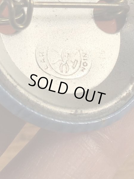 ユニオンラベルの刻印が付いたスマイルの70年代ビンテージ缶バッジ