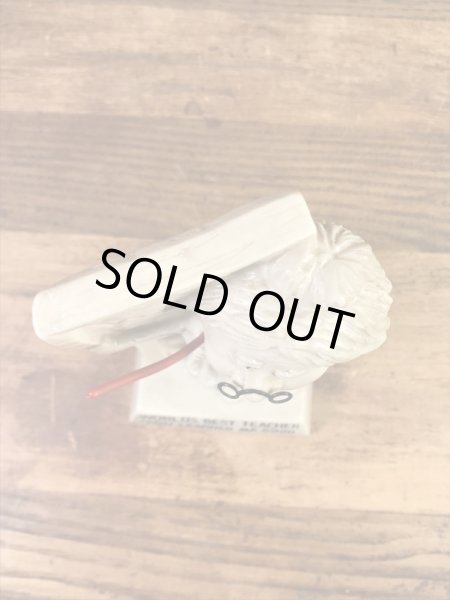 “World's Best Teacher...”のメッセージが書かれたシリスカルプスの70年代ビンテージメッセージドール