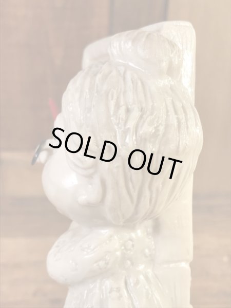 “World's Best Teacher...”のメッセージが書かれたシリスカルプスの70年代ビンテージメッセージドール