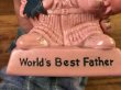 “World's Bast Father”のメッセージが書かれたシリスカルプスの70年代ビンテージメッセージドール