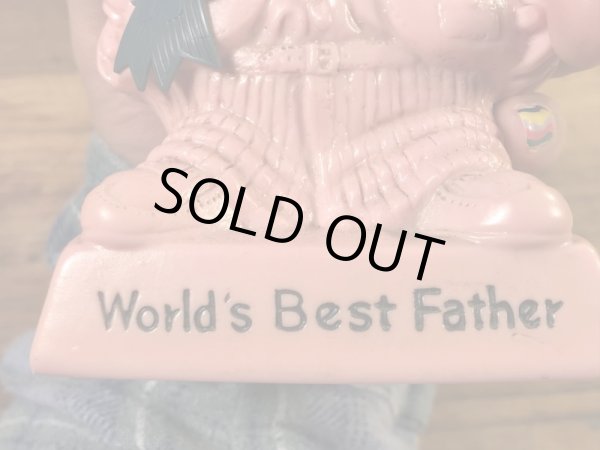 “World's Bast Father”のメッセージが書かれたシリスカルプスの70年代ビンテージメッセージドール