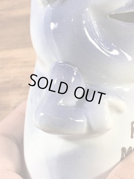 サイコセラミックスみたいなメッセージが書かれた60’sヴィンテージコインバンク