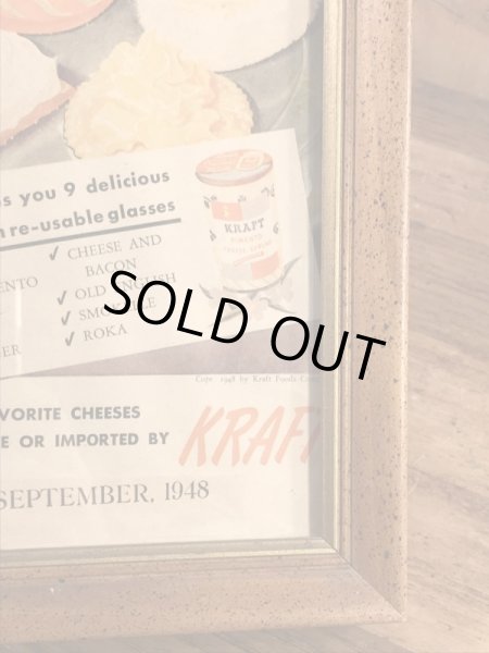 木製の額縁にクラフトチーズの広告が入った40’sヴィンテージ壁掛け