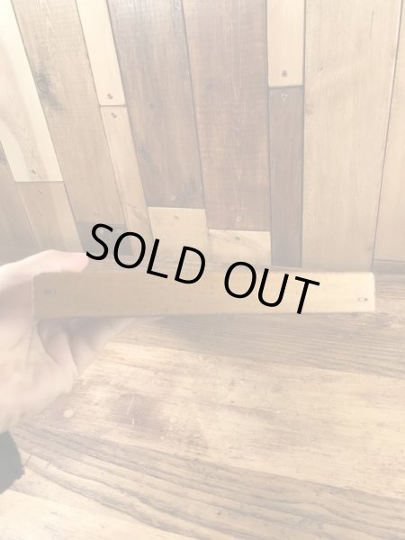 木製の額縁にクラフトチーズの広告が入った50’sヴィンテージ壁掛け