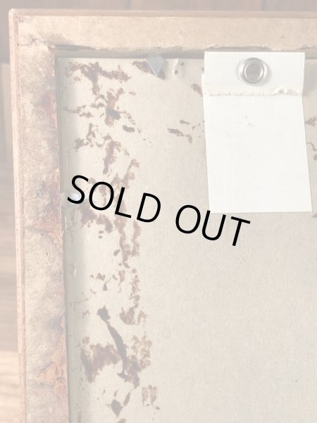 木製の額縁にクラフトチーズの広告が入った50’sヴィンテージ壁掛け