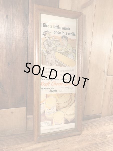 ガラスの額縁にクラフトチーズの広告が入った50年代ビンテージ壁掛け