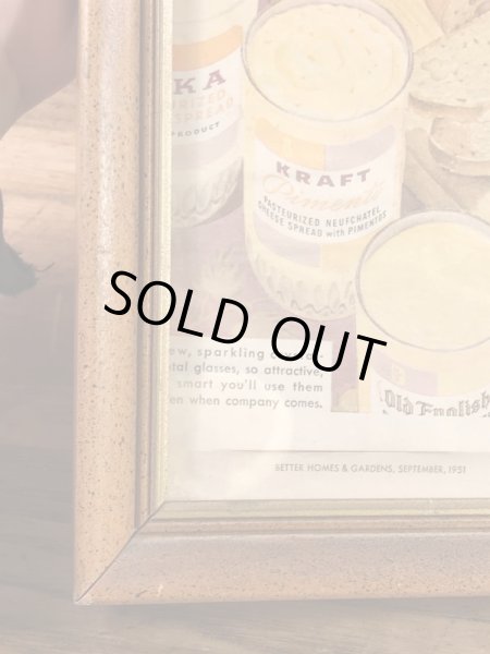 ガラスの額縁にクラフトチーズの広告が入った50年代ビンテージ壁掛け