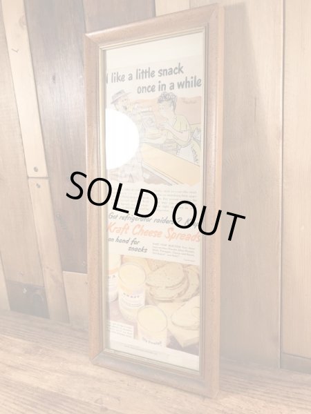 木製の額縁にクラフトチーズの広告が入った50’sヴィンテージ壁掛け