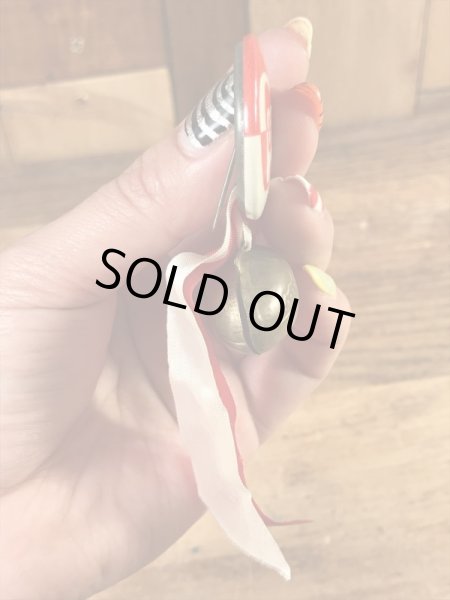 カレッジ物のフットボール大会の40’sヴィンテージ缶バッチ