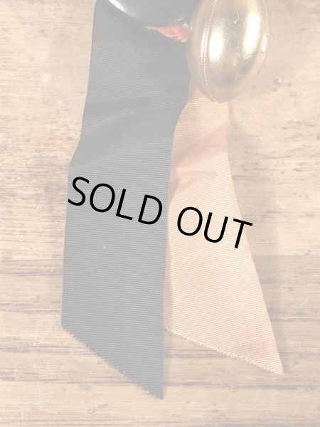 カレッジ物のフットボール大会の40年代ビンテージ缶バッジ