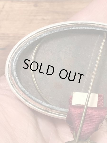 カレッジ物のフットボールイベントの60年代ビンテージ缶バッジ