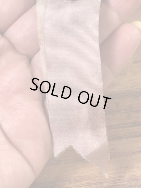 カレッジ物のフットボール大会の40’sヴィンテージ缶バッチ