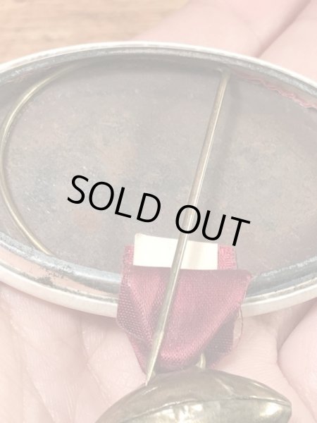 カレッジ物のフットボールイベントの60年代ビンテージ缶バッジ