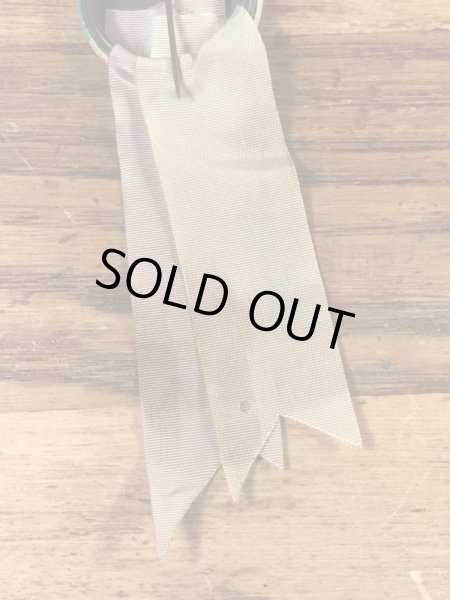 ユニバーシティ物のフットボール大会の40年代ビンテージ缶バッジ