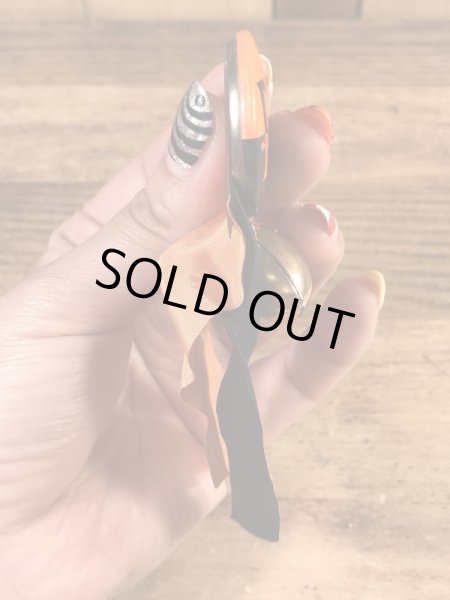 カレッジ物のフットボール大会の40年代ビンテージ缶バッジ