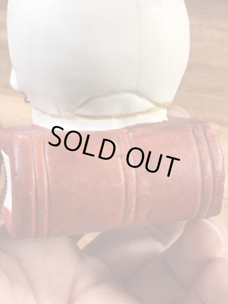 スカルオンブックの陶器製の50年代ビンテージマッチホルダー