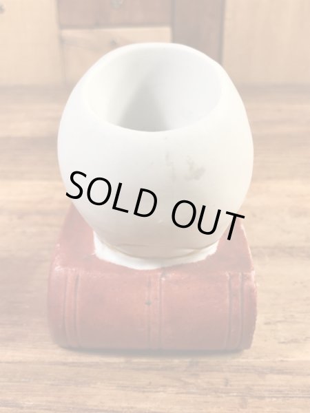 スカルオンブックの陶器製の50年代ビンテージマッチホルダー