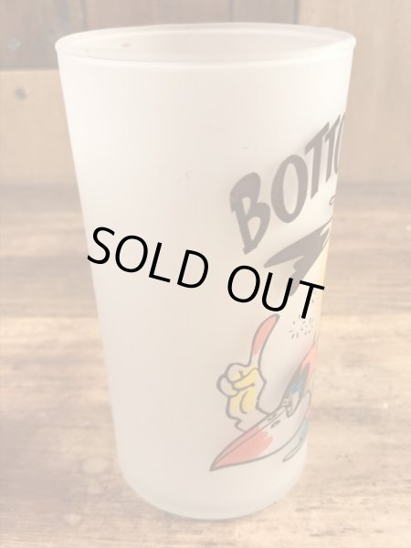 “Bottoms Up!”のメッセージが書かれたキツツキのキャラクターの60年代ビンテージグラス