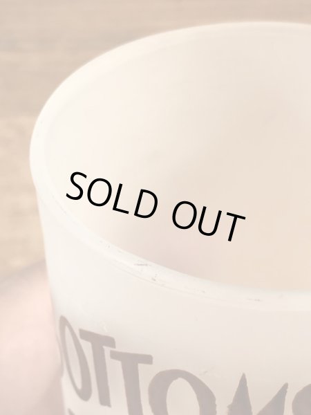 “Bottoms Up!”のメッセージが書かれたキツツキのキャラクターの60年代ビンテージグラス