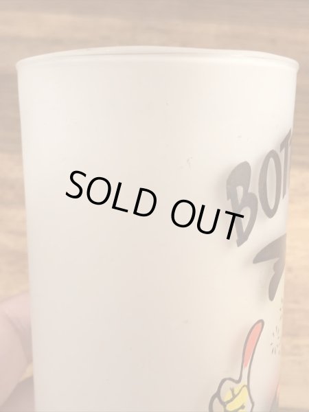 “Bottoms Up!”のメッセージが書かれたキツツキのキャラクターの60年代ビンテージグラス