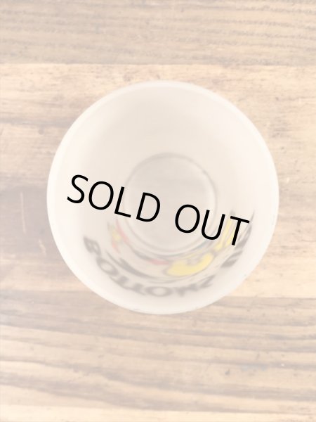 “Bottoms Up!”のメッセージが書かれたキツツキのキャラクターの60年代ビンテージグラス