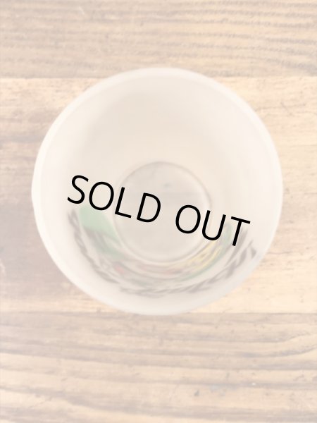 “Down The Hatch!”のメッセージが書かれたキツツキのキャラクターの60年代ビンテージグラス