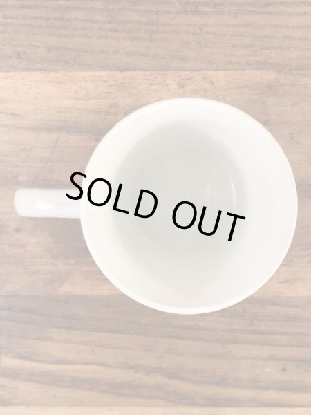 企業キャラクターのレイドバグの70年代ビンテージプラスチックマグ