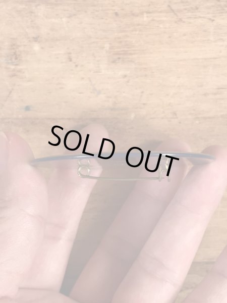 企業キャラクターのウッジーオウルの60〜70年代ビンテージレンチキュラー缶バッジ