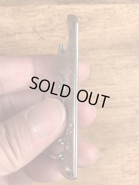 企業物の折り畳みのコークスクリューが付いたビンテージ栓抜き