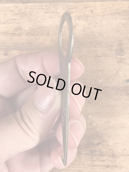 アンティークのポケットツールが付いたビンテージ栓抜き