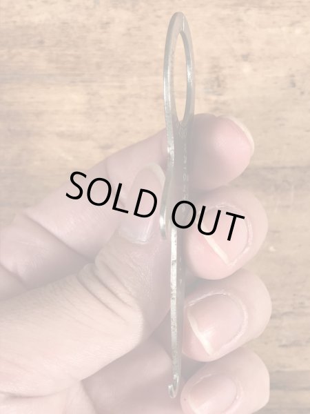 アンティークのポケットツールが付いたビンテージ栓抜き