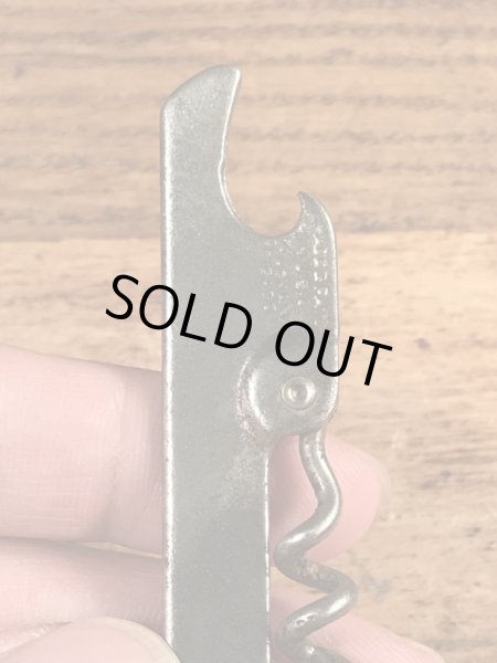 ホテルの企業物のコークスクリューが付いたビンテージ栓抜き