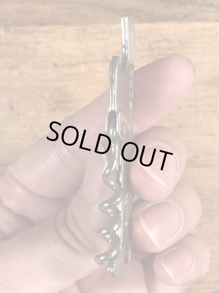 企業物の折り畳みのコークスクリューが付いたビンテージ栓抜き