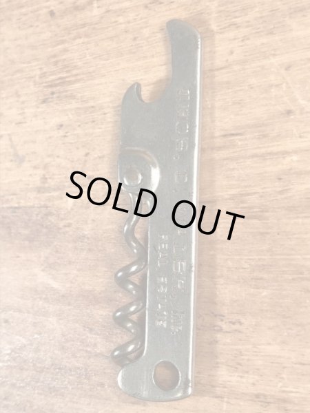 企業物の折り畳みのコークスクリューが付いたヴィンテージボトルオープナー