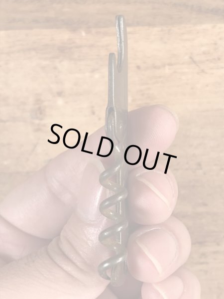 企業物の折り畳みのコークスクリューが付いたビンテージ栓抜き