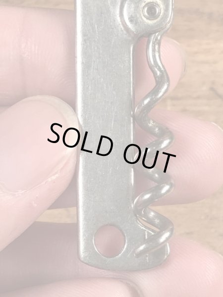 企業物の折り畳みのコークスクリューが付いたヴィンテージボトルオープナー