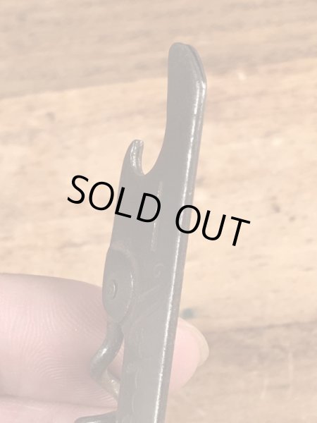 企業物の折り畳みのコークスクリューが付いたビンテージ栓抜き