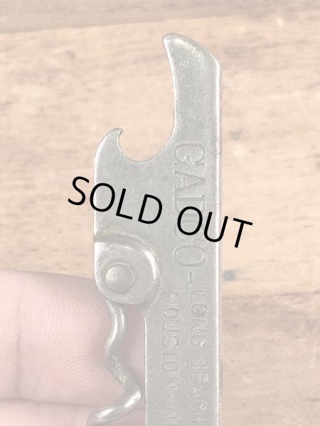 企業物の折り畳みのコークスクリューが付いたビンテージ栓抜き