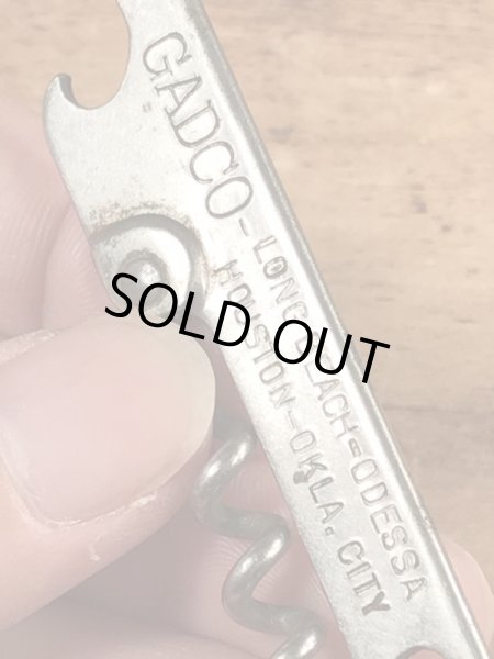 企業物の折り畳みのコークスクリューが付いたビンテージ栓抜き