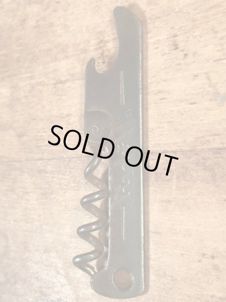 企業物の折り畳みのコークスクリューが付いたヴィンテージボトルオープナー