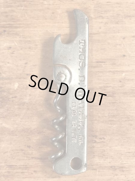 企業物の折り畳みのコークスクリューが付いたビンテージ栓抜き