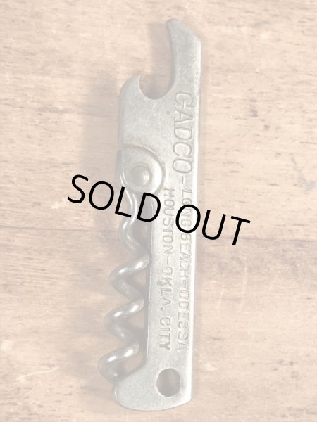 企業物の折り畳みのコークスクリューが付いたビンテージ栓抜き