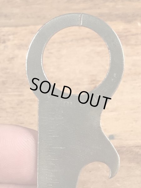 アンティークのポケットツールが付いたビンテージ栓抜き