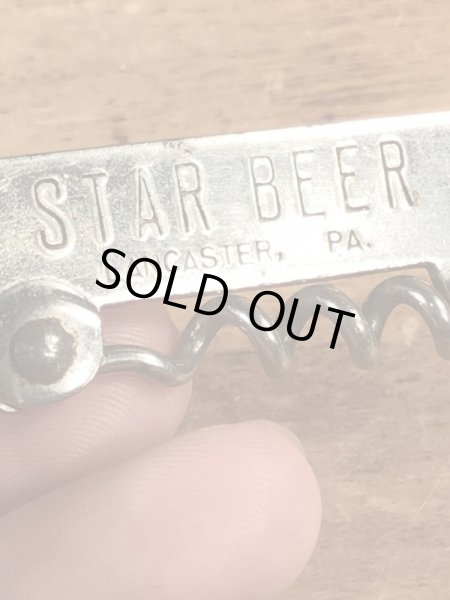 スタービールの折り畳みのコークスクリューが付いたビンテージ栓抜き